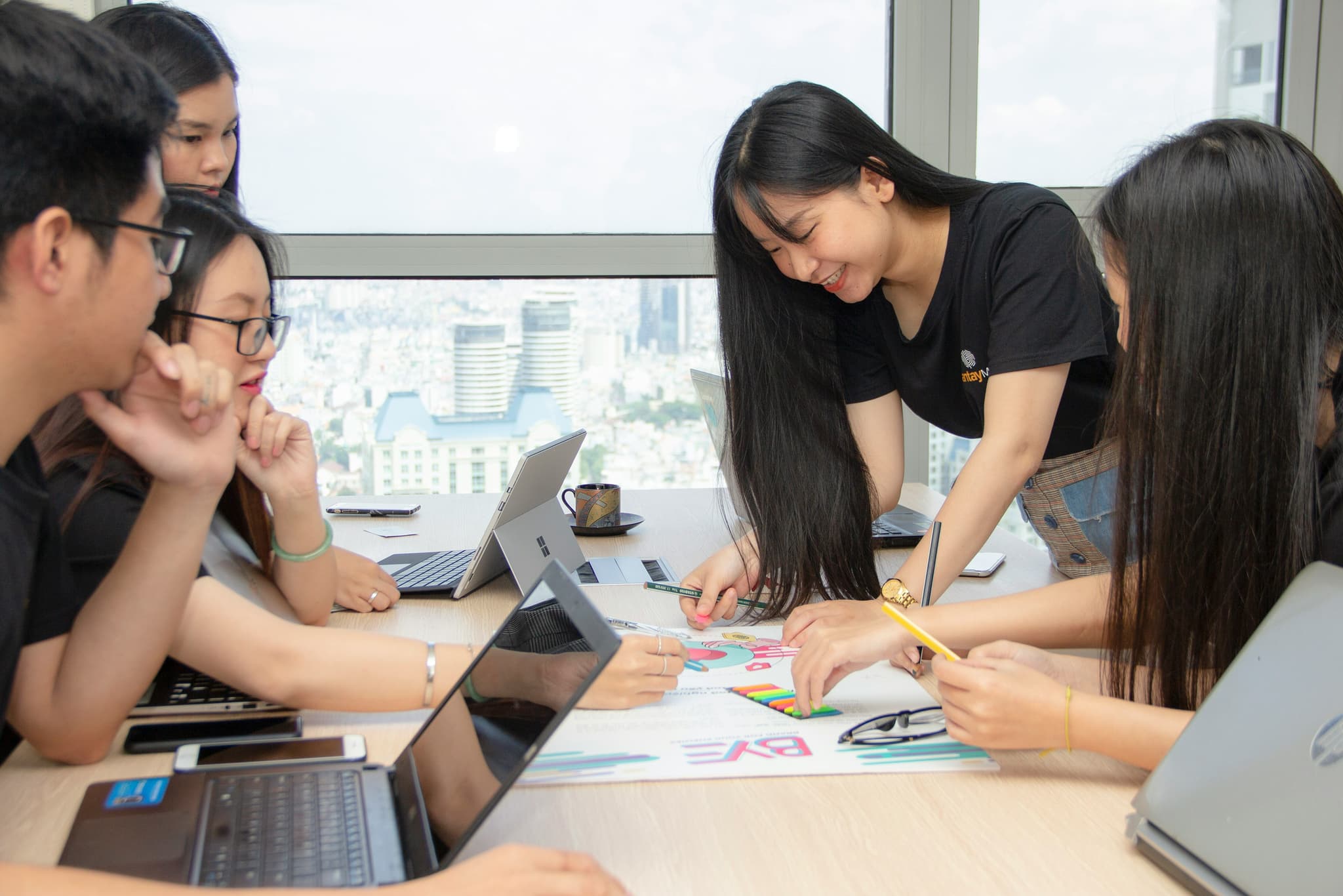 A small team working together around a table